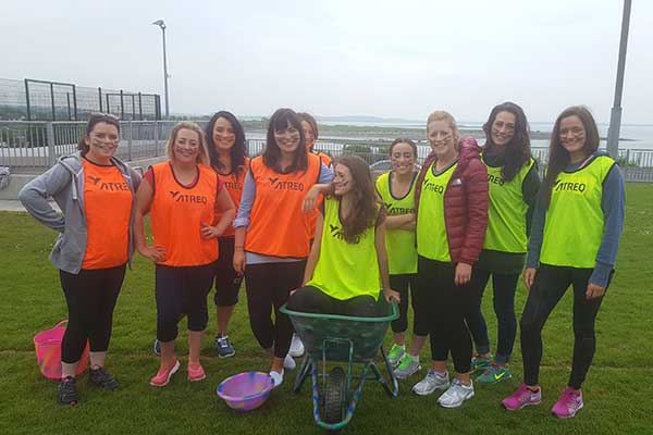 Group taking part in outdoor sports activity games at Astrobay