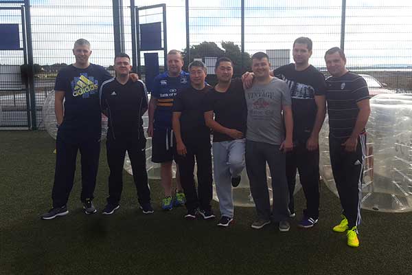 Stag group posing with Bubble Footballs at Astrobay Galway