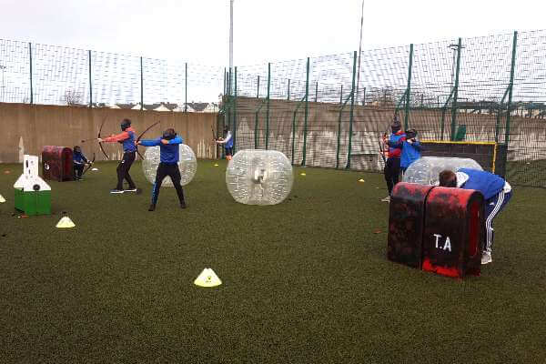 Glenstal Abbey students from Limerick enjoying a Battle Zone Archery and Bubble Football Combo at Astrobay