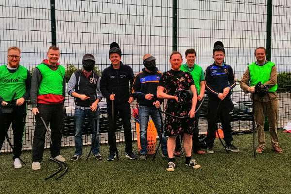 Group of players after Bubble Football and Battle Zone archery games.