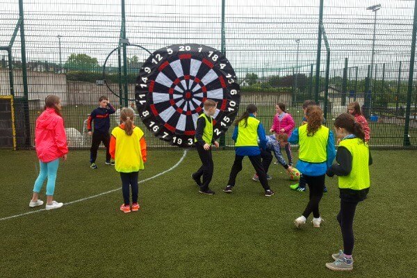 Group of children playing velcro soccer at Astrobay