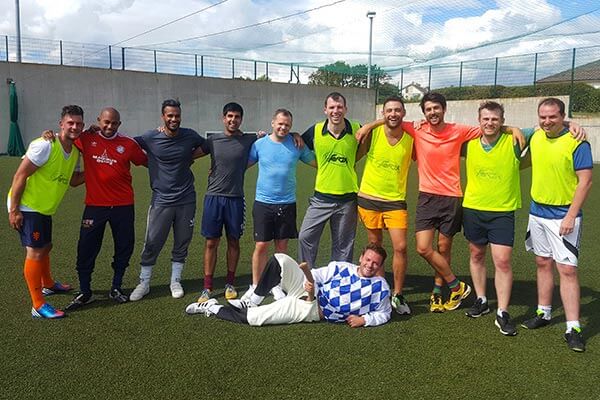 Stag group posing for team photo.