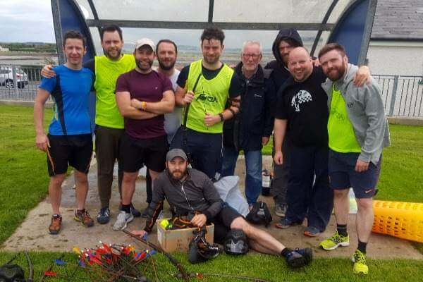 Stag group pose for team photo