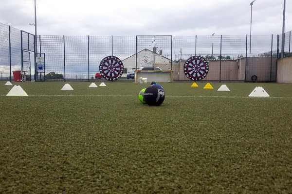 Astro pitch set up for multiple activities for a Stag party